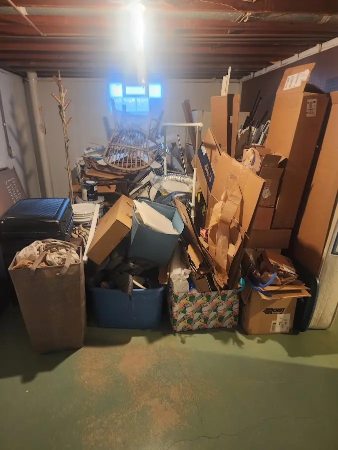 Roll-off dumpster container at job site for Construction Dumpster Rental in Brook Highland